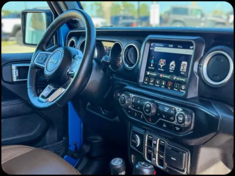More photos of 2022 Jeep Wrangler Unlimited Sahara at Champion Chrysler Dodge Jeep Ram, MS