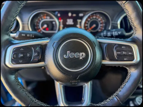 Another view of 2022 Jeep Wrangler Unlimited Sahara for sale in Gulfport, MS at Champion Chrysler Dodge Jeep Ram