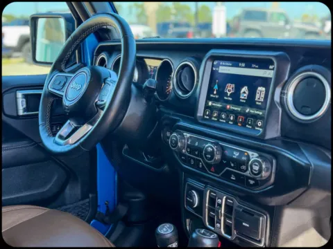 More photos of 2022 Jeep Wrangler Unlimited Sahara at Champion Chrysler Dodge Jeep Ram, MS