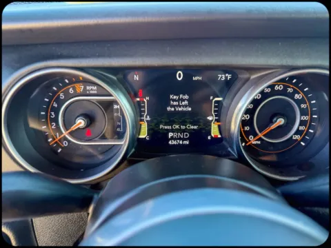 Photos of 2022 Jeep Wrangler Unlimited Sahara for sale in Gulfport, MS at Champion Chrysler Dodge Jeep Ram