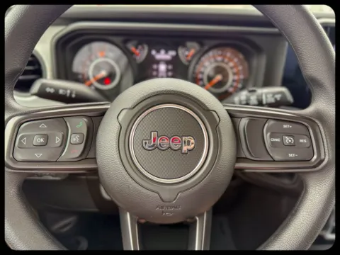 Photos of 2026 Jeep Wrangler Sport for sale in Gulfport, MS at Champion Chrysler Dodge Jeep Ram