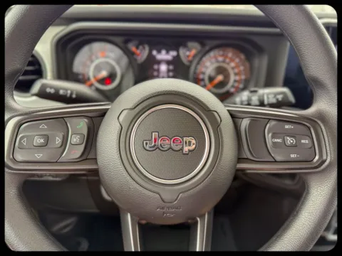 Photos of 2026 Jeep Wrangler Sport for sale in Gulfport, MS at Champion Chrysler Dodge Jeep Ram