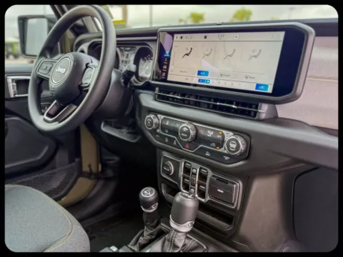 More photos of 2026 Jeep Wrangler Sport at Champion Chrysler Dodge Jeep Ram, MS