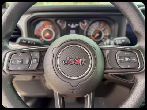 Photos of 2026 Jeep Wrangler Sport for sale in Gulfport, MS at Champion Chrysler Dodge Jeep Ram