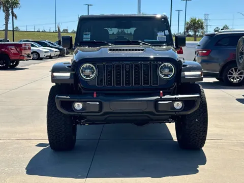 Photos of 2026 Jeep Wrangler Rubicon X for sale in Gulfport, MS at Champion Chrysler Dodge Jeep Ram