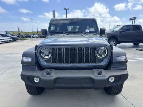 Photos of 2026 Jeep Wrangler Sport S for sale in Gulfport, MS at Champion Chrysler Dodge Jeep Ram