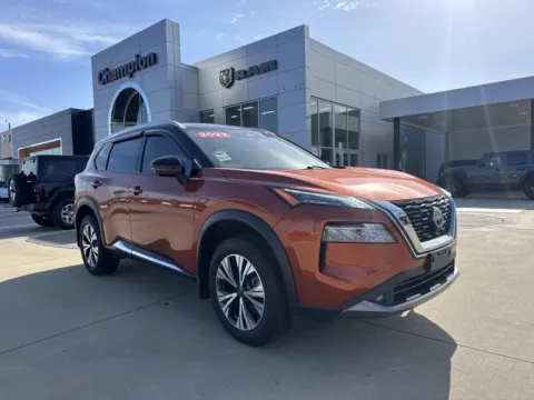 Orange 2022 Nissan Rogue SL for sale in Gulfport, MS