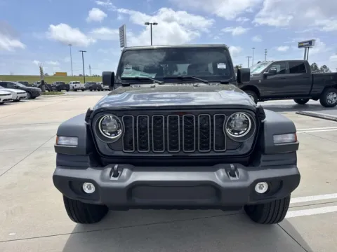 Photos of 2026 Jeep Wrangler Sport S for sale in Gulfport, MS at Champion Chrysler Dodge Jeep Ram