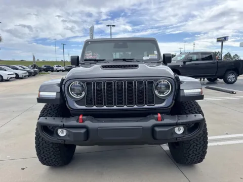 Photos of 2026 Jeep Wrangler Rubicon X for sale in Gulfport, MS at Champion Chrysler Dodge Jeep Ram