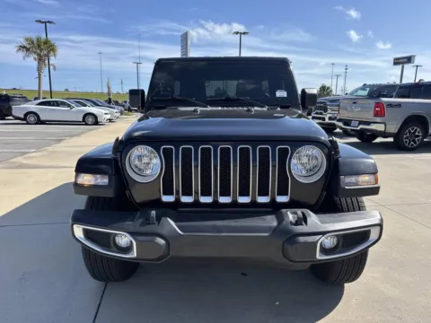 Photos of 2022 Jeep Wrangler Unlimited Sahara for sale in Gulfport, MS at Champion Chrysler Dodge Jeep Ram