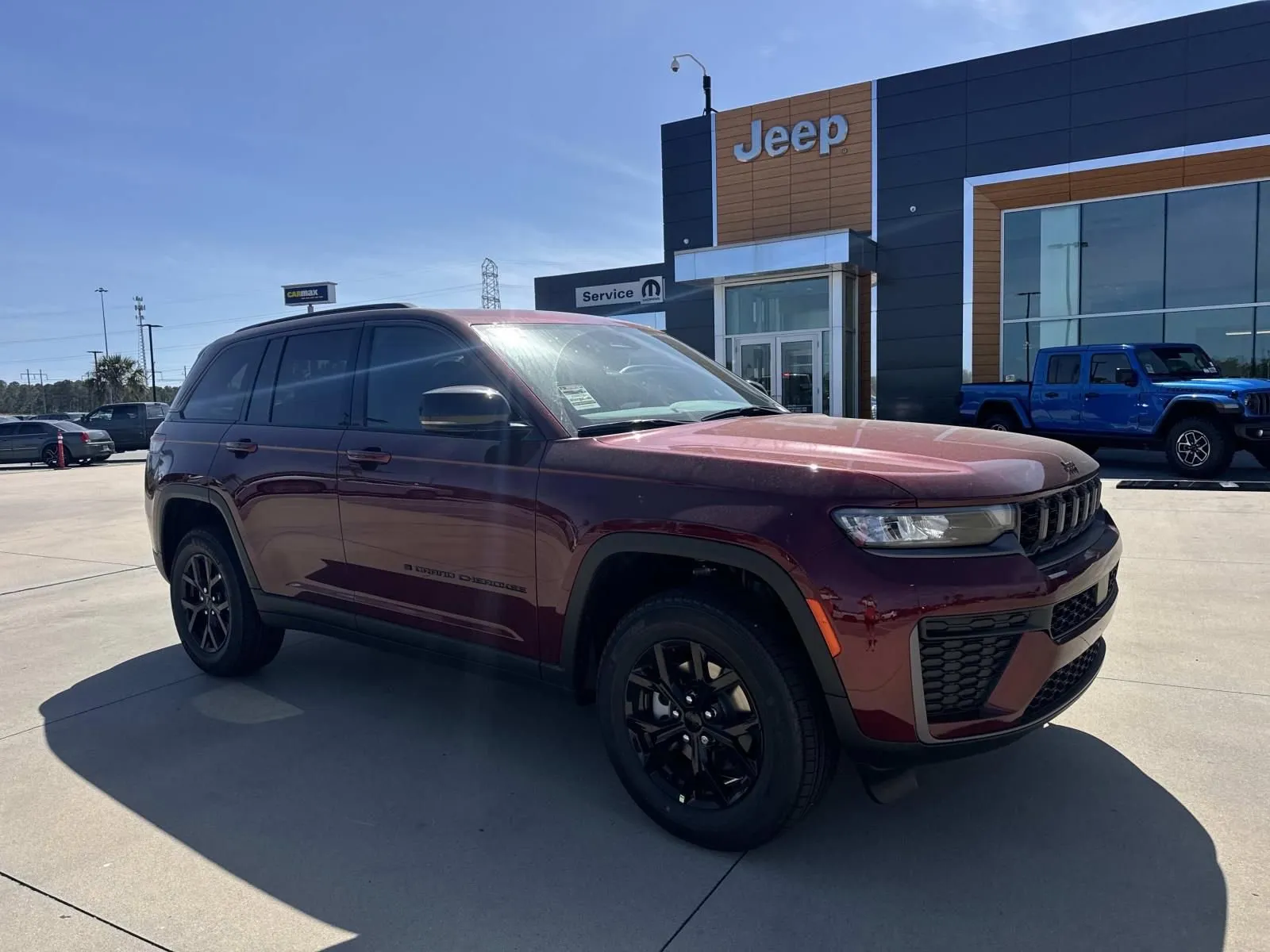 Red 2026 Jeep Grand Cherokee Laredo Altitude for sale in Gulfport, MS