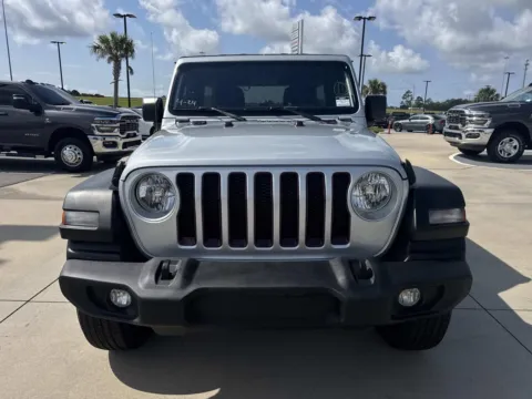 Photos of 2023 Jeep Wrangler Sport S for sale in Gulfport, MS at Champion Chrysler Dodge Jeep Ram
