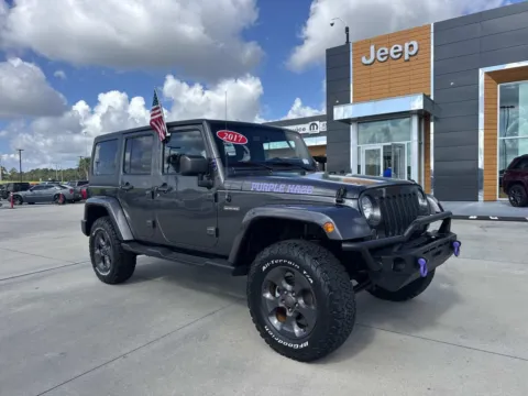 Gray 2017 Jeep Wrangler Unlimited Freedom for sale in Gulfport, MS