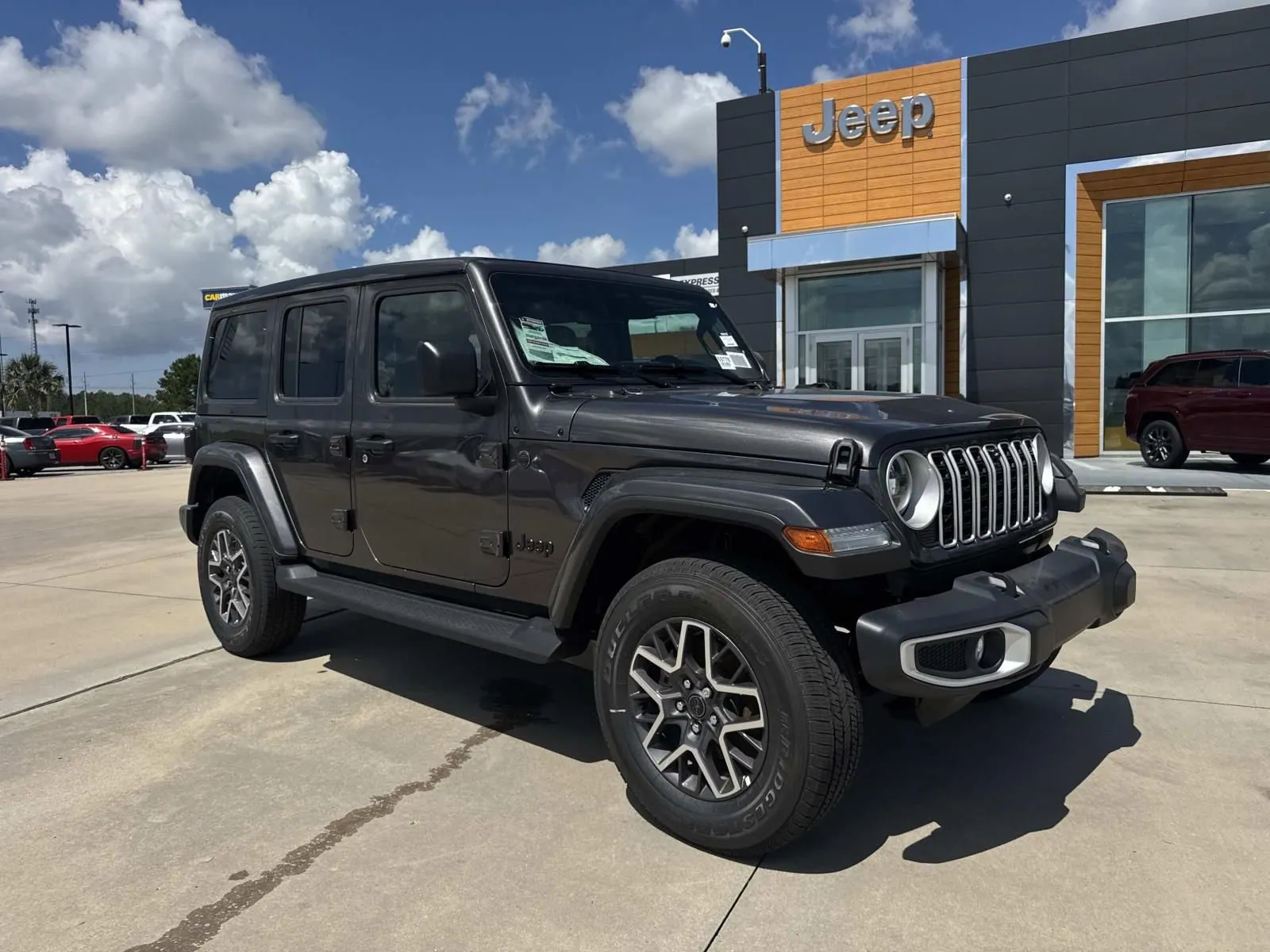 Gray 2026 Jeep Wrangler Sahara for sale in Gulfport, MS