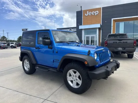 Blue 2015 Jeep Wrangler Sport for sale in Gulfport, MS