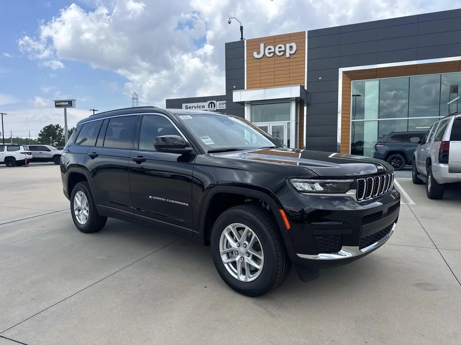 Black 2026 Jeep Grand Cherokee L Laredo for sale in Gulfport, MS