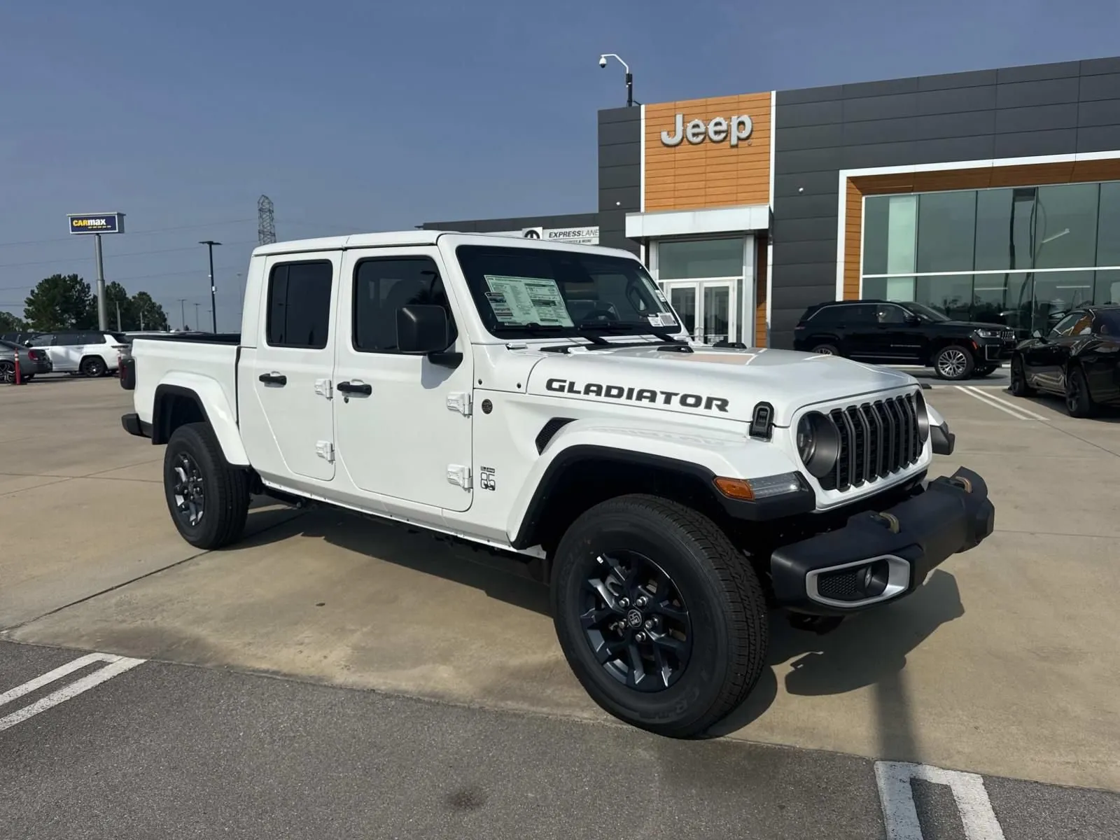 White 2026 Jeep Gladiator 85th Anniversary Edition for sale in Gulfport, MS