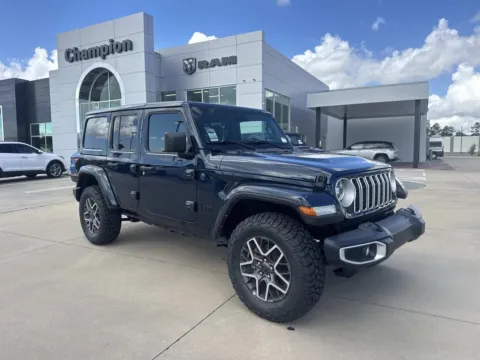 Blue 2025 Jeep Wrangler Sahara for sale in Gulfport, MS