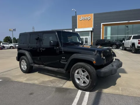 Black 2015 Jeep Wrangler Unlimited Sport for sale in Gulfport, MS