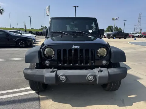 Photos of 2015 Jeep Wrangler Unlimited Sport for sale in Gulfport, MS at Champion Chrysler Dodge Jeep Ram