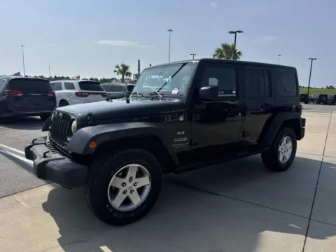 Another view of 2015 Jeep Wrangler Unlimited Sport for sale in Gulfport, MS at Champion Chrysler Dodge Jeep Ram