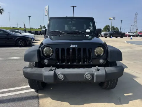 Photos of 2015 Jeep Wrangler Unlimited Sport for sale in Gulfport, MS at Champion Chrysler Dodge Jeep Ram
