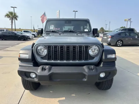 Photos of 2024 Jeep Wrangler Sport S for sale in Gulfport, MS at Champion Chrysler Dodge Jeep Ram