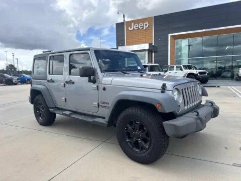 Silver 2015 Jeep Wrangler Unlimited Sport for sale in Gulfport, MS