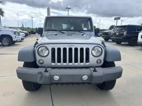 Photos of 2015 Jeep Wrangler Unlimited Sport for sale in Gulfport, MS at Champion Chrysler Dodge Jeep Ram