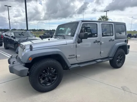Another view of 2015 Jeep Wrangler Unlimited Sport for sale in Gulfport, MS at Champion Chrysler Dodge Jeep Ram