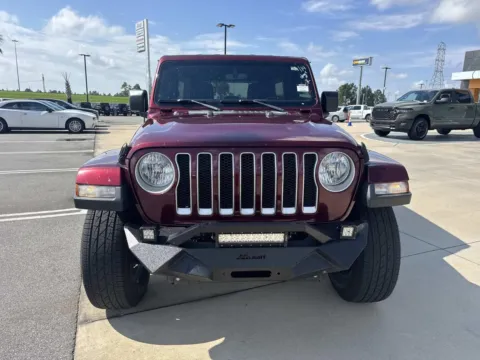 Photos of 2021 Jeep Wrangler Unlimited Sahara for sale in Gulfport, MS at Champion Chrysler Dodge Jeep Ram