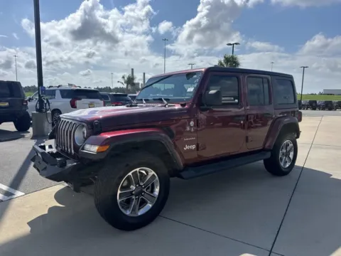 Another view of 2021 Jeep Wrangler Unlimited Sahara for sale in Gulfport, MS at Champion Chrysler Dodge Jeep Ram