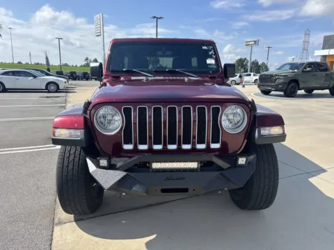 Photos of 2021 Jeep Wrangler Unlimited Sahara for sale in Gulfport, MS at Champion Chrysler Dodge Jeep Ram