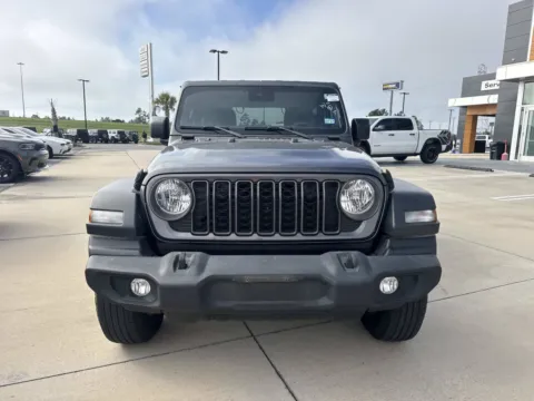 Photos of 2024 Jeep Wrangler Sport S for sale in Gulfport, MS at Champion Chrysler Dodge Jeep Ram