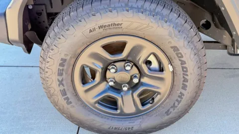 Photos of 2025 Jeep Wrangler Sport for sale in Gulfport, MS at Champion Chrysler Dodge Jeep Ram