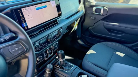 Another view of 2025 Jeep Wrangler Sport for sale in Gulfport, MS at Champion Chrysler Dodge Jeep Ram