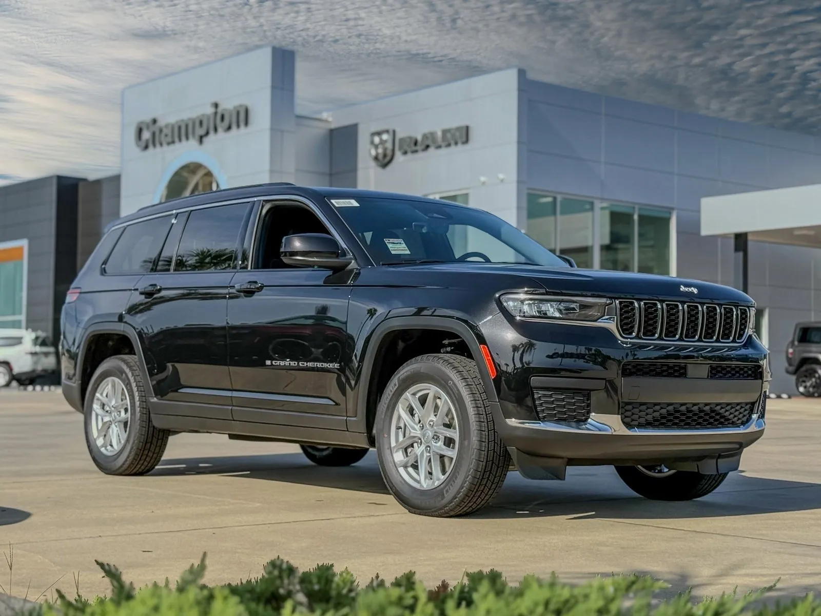 Black 2025 Jeep Grand Cherokee L Laredo X for sale in Gulfport, MS