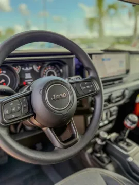 More photos of 2025 Jeep Wrangler Sport at Champion Chrysler Dodge Jeep Ram, MS