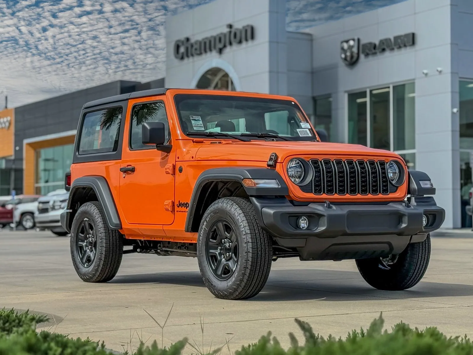 Orange 2025 Jeep Wrangler Sport for sale in Gulfport, MS