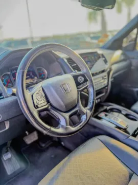 Photos of 2021 Honda Passport Touring for sale in Gulfport, MS at Champion Chrysler Dodge Jeep Ram