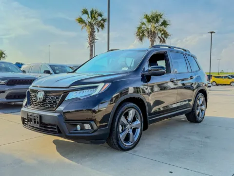 Photos of 2021 Honda Passport Touring for sale in Gulfport, MS at Champion Chrysler Dodge Jeep Ram