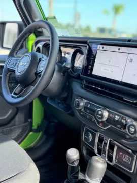 Another view of 2025 Jeep Wrangler Sport S for sale in Gulfport, MS at Champion Chrysler Dodge Jeep Ram