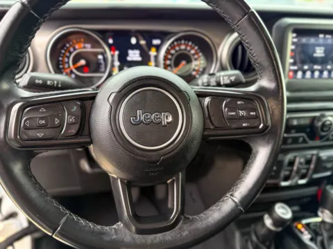 Photos of 2021 Jeep Wrangler Unlimited Sport S for sale in Gulfport, MS at Champion Chrysler Dodge Jeep Ram