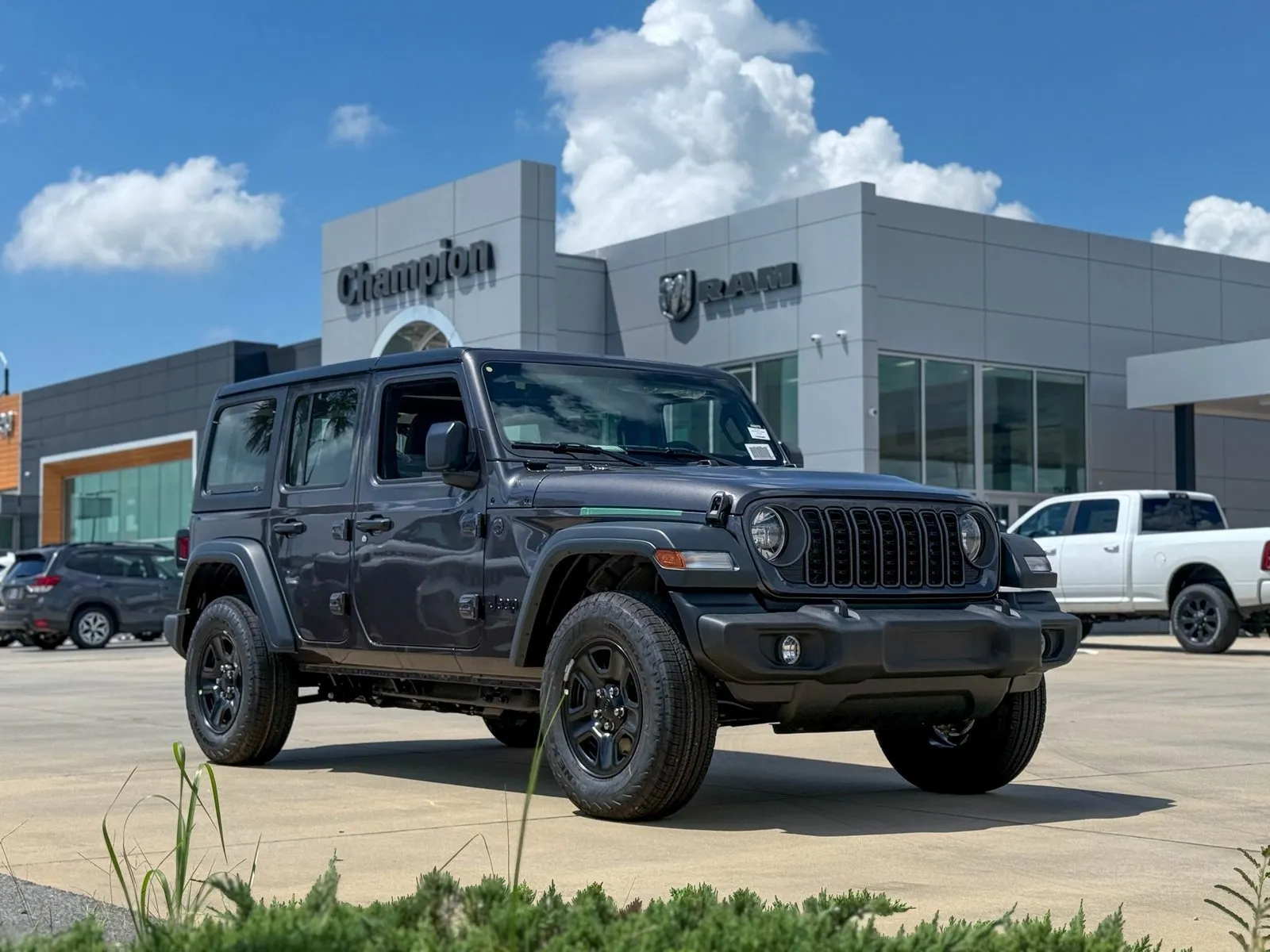 Gray 2025 Jeep Wrangler Sport for sale in Gulfport, MS