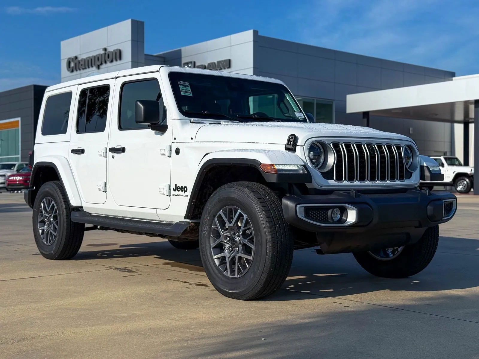 White 2025 Jeep Wrangler Sahara for sale in Gulfport, MS