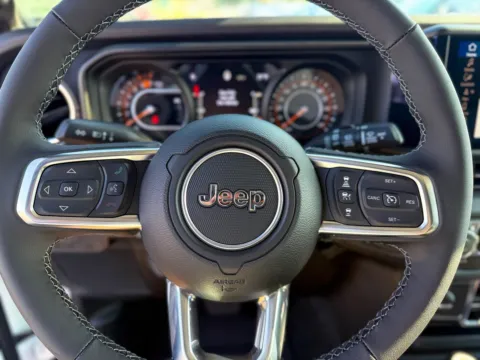 Photos of 2025 Jeep Wrangler Sahara for sale in Gulfport, MS at Champion Chrysler Dodge Jeep Ram