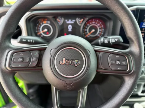 Photos of 2025 Jeep Wrangler Sport for sale in Gulfport, MS at Champion Chrysler Dodge Jeep Ram