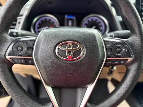 Photos of 2023 Toyota Camry LE for sale in Gulfport, MS at Champion Chrysler Dodge Jeep Ram