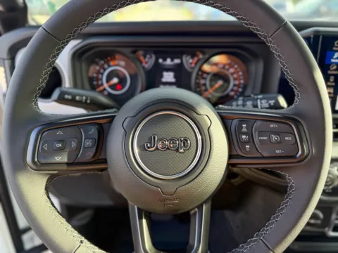 Photos of 2025 Jeep Wrangler Sport S for sale in Gulfport, MS at Champion Chrysler Dodge Jeep Ram