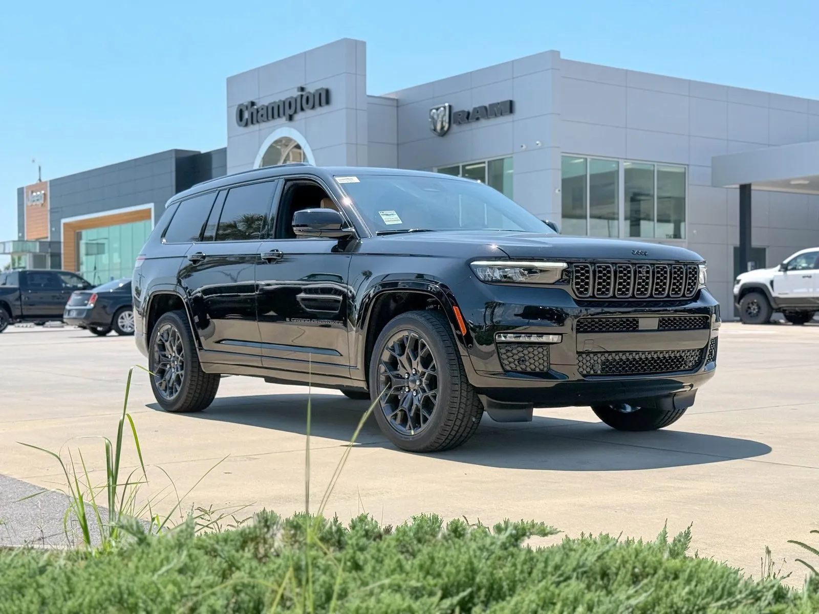 Black 2025 Jeep Grand Cherokee L Summit for sale in Gulfport, MS